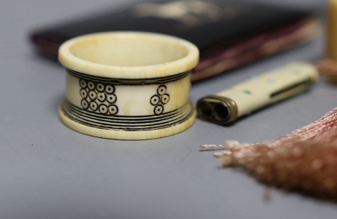 A George III ivory needle case, 6cm. a Victorian card purse inlaid with a whippet, 9.5cm, a horn snuff box and four other items.